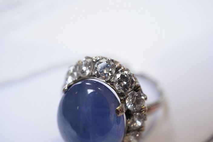 A sapphire and diamond ring, mid 20th century